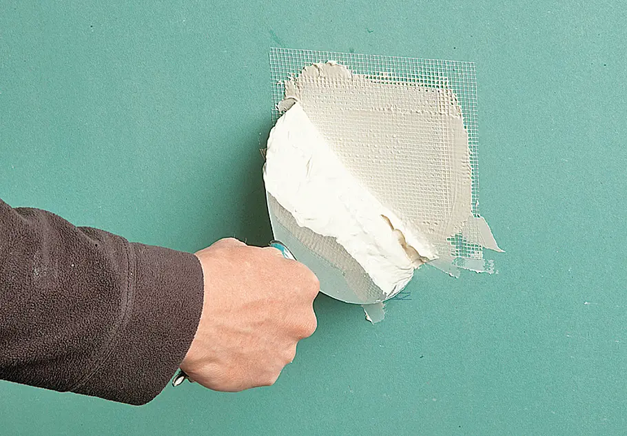 GK-Wand reparieren: Schritt 7 von 9 Gipskartonwand reparieren