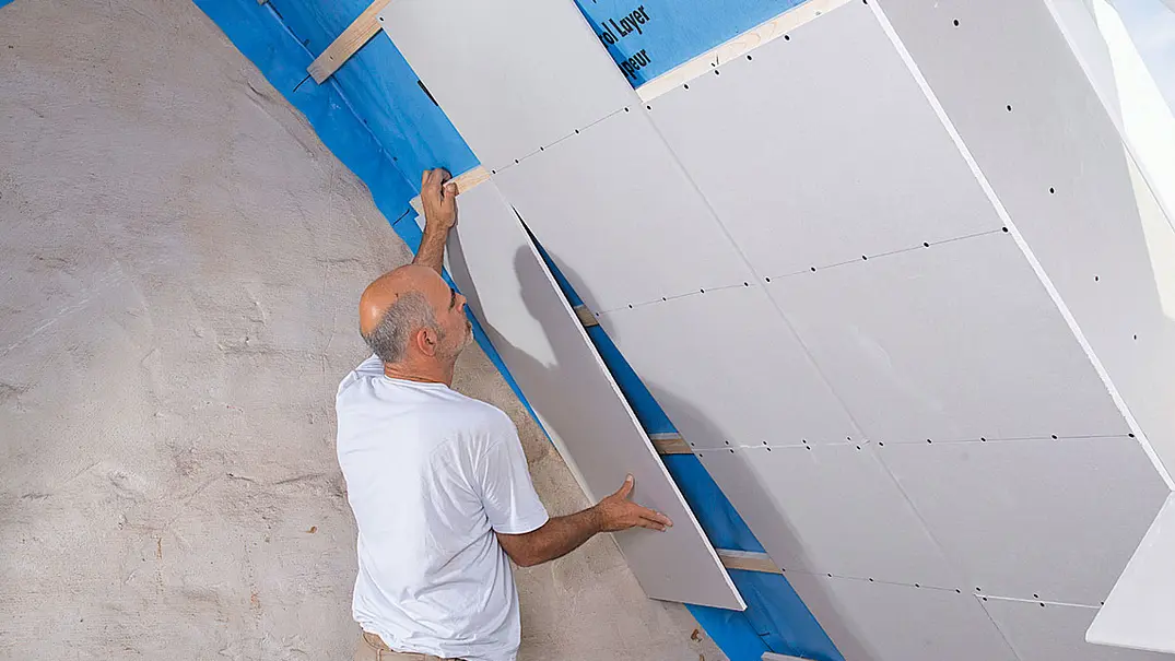 Dachstuhl mit Trockenbauplatten verkleiden - Foto: sidm/Claudio Kalex Dachstuhl mit Trockenbauplatten verkleiden - Foto: sidm/Claudio Kalex
