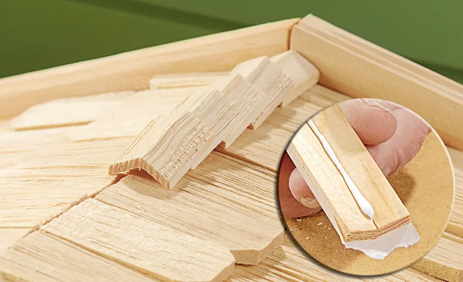 Stallkrippe bauen: Schritt 42 von 53 Firstziegel decken