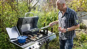 Mann am Grill Mann am Grill