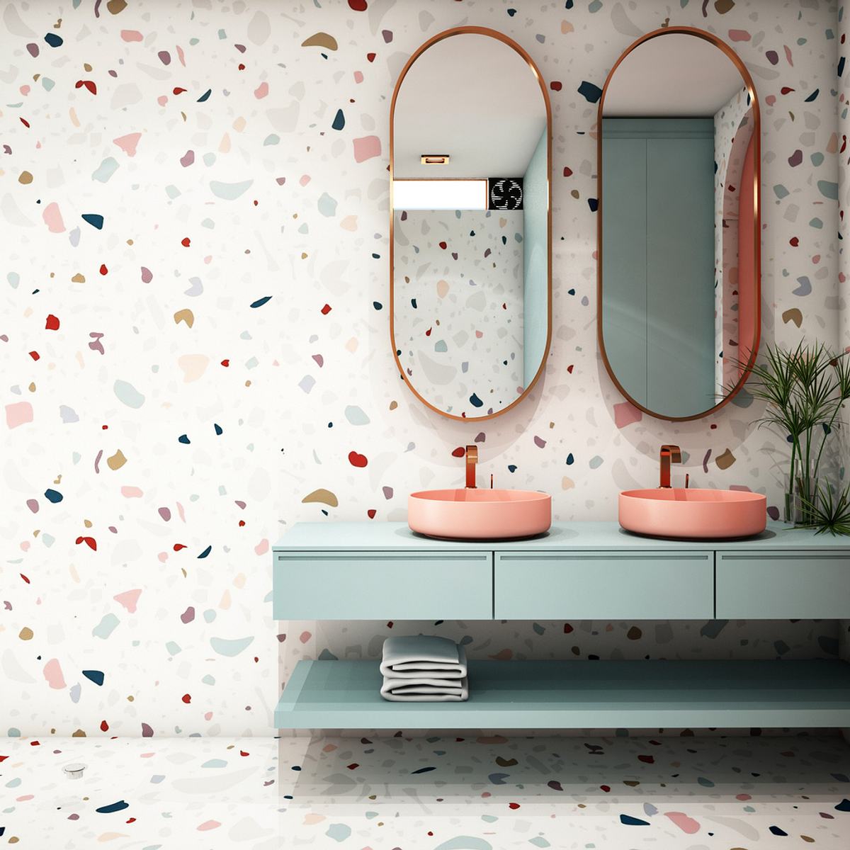 Ein Badezimmer mit pinken Waschbecken und mintgrünen Schränken
