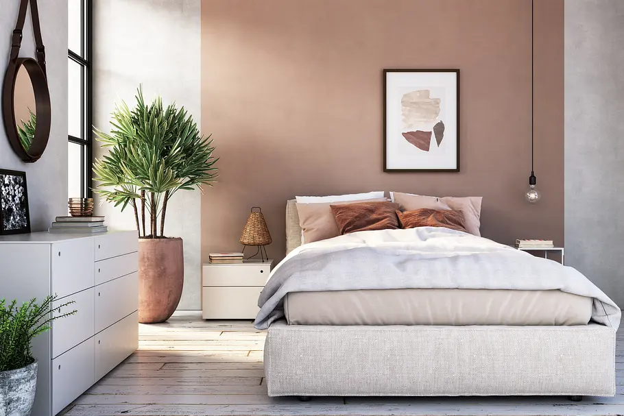 Ein Schlafzimmer in Rosa- und Naturtönen